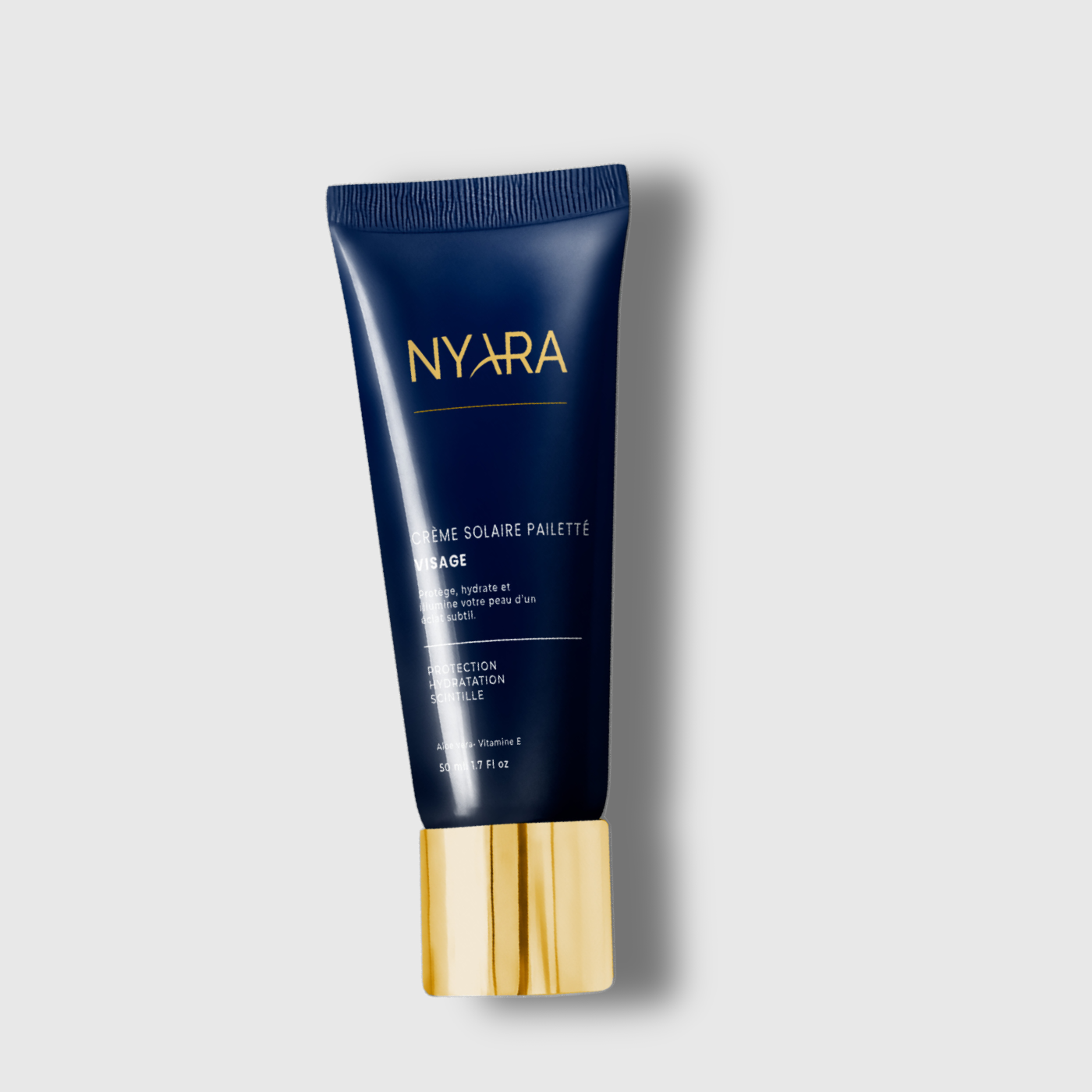 Spray solaire pailetté visage